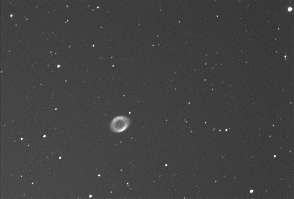 Image very slightly out of focus, IC1296 faintly visible in the negative image. M57 is 2000 ly away, & IC1296 is 200,000,000 ly away. Better image coming soon !